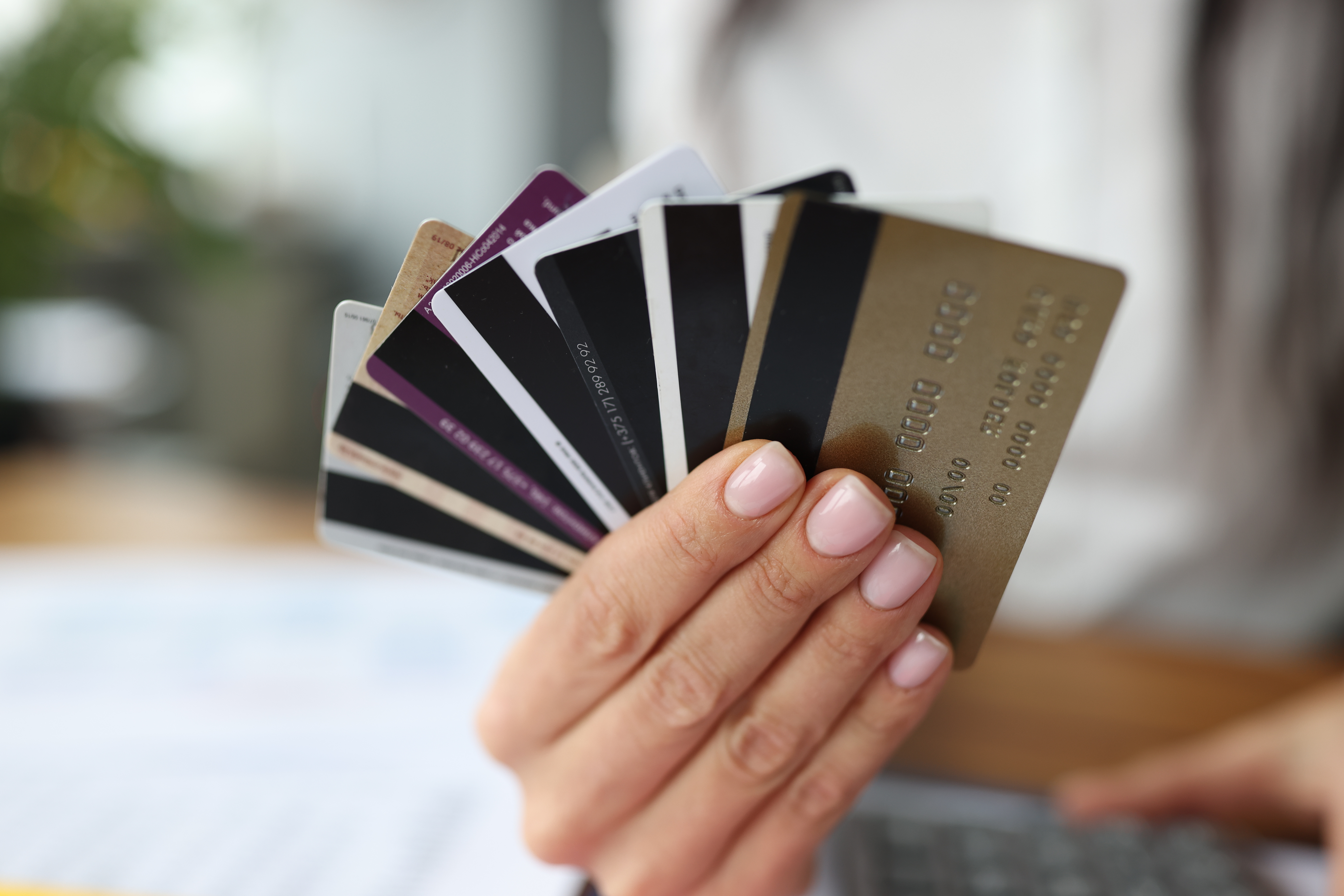 credit cards in a woman's hand